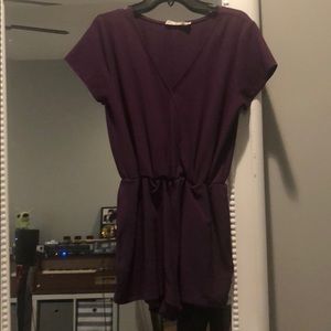 Purple romper. Snaps in the front